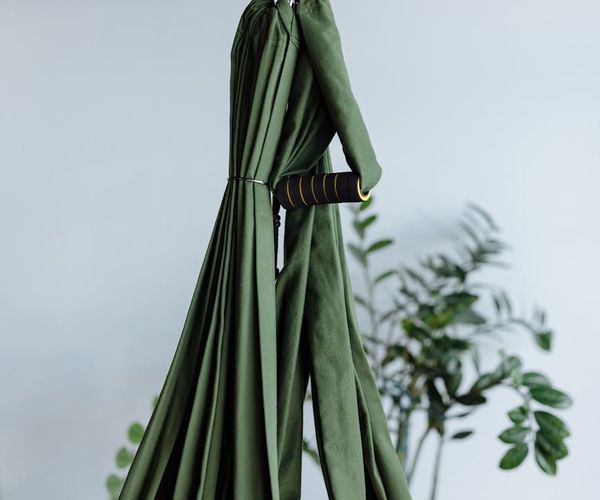 A calm and minimalist yoga studio interior with soft lighting and plants.